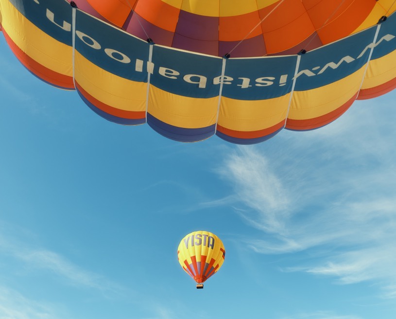 Hot air balloons with sky and clouds in the background